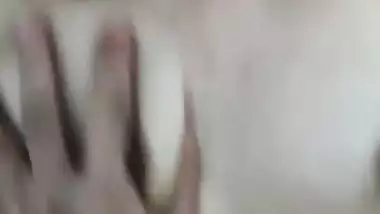 Brown haired cam girl boob pressing and pussy fingering