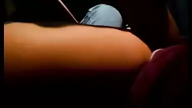 Outdoor sex of a guy sucking a girl’s boobs in a car