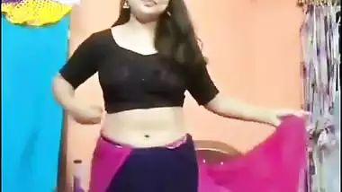 Cute girl stripping saree and showing naked boobs