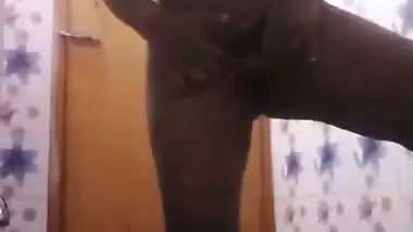 Bhabhi in bathroom baths and fingers cunt in horny mood