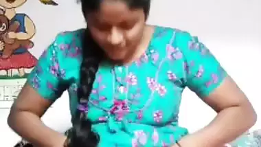 Desi Tamil girl strips and exposes her hairy pussy and ass
