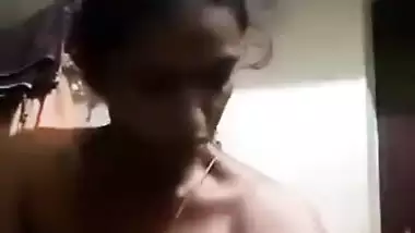 Unsatisfied Tamil village aunty striptease nude MMS