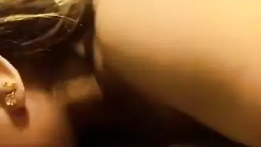 Lady gives an Indian blowjob to her lover in bed